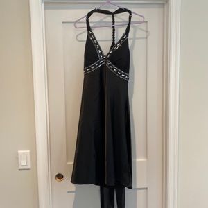 Black dress size 8 worn once. Cool back detail/tie